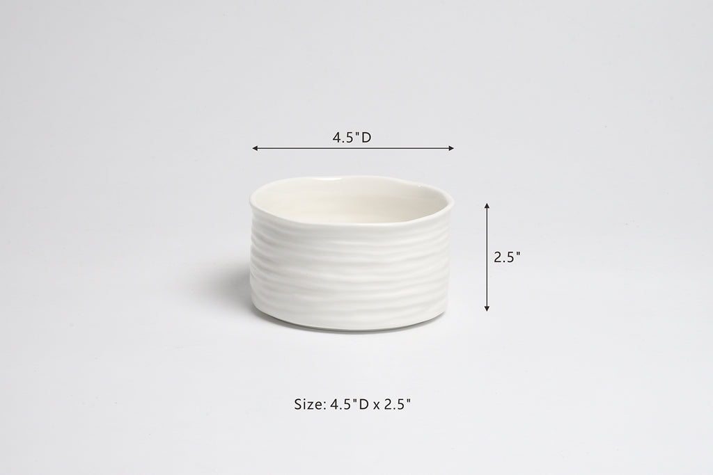 White ceramic bowl with dimensions on a light gray background