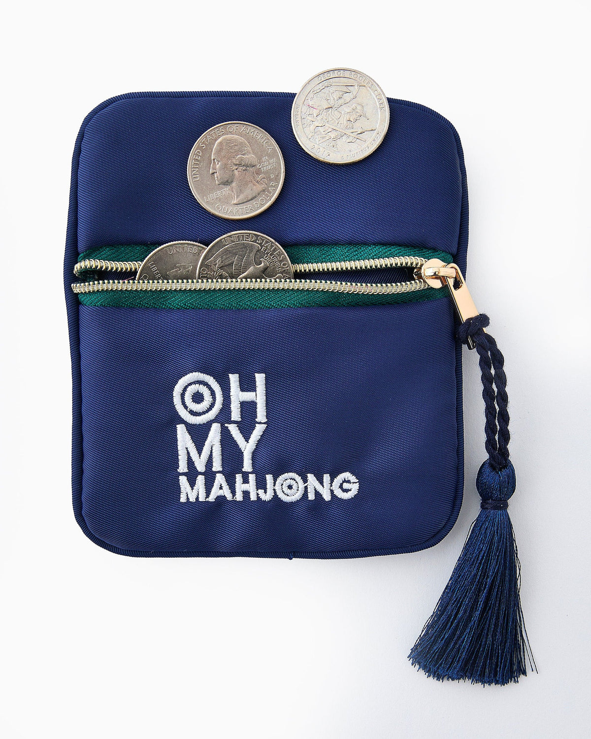 Blue Mahjong bag displayed with coins and dice next to it.