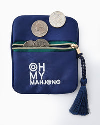 Blue Mahjong bag displayed with coins and dice next to it.