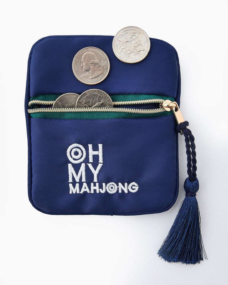 Blue Mahjong bag displayed with coins and dice next to it.