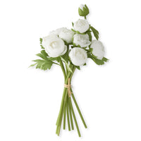 Bouquet of white ranunculus flowers with green leaves on a white background