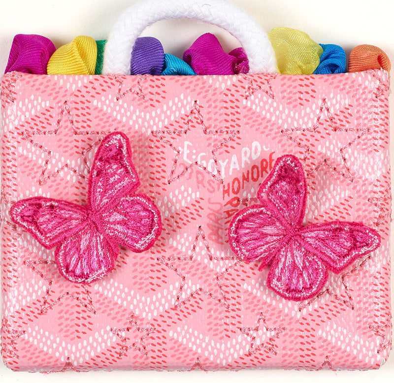 Collectible designer-inspired Petite Goyard Bag art piece, pink embroidery with butterflies, signed and framed in acrylic.