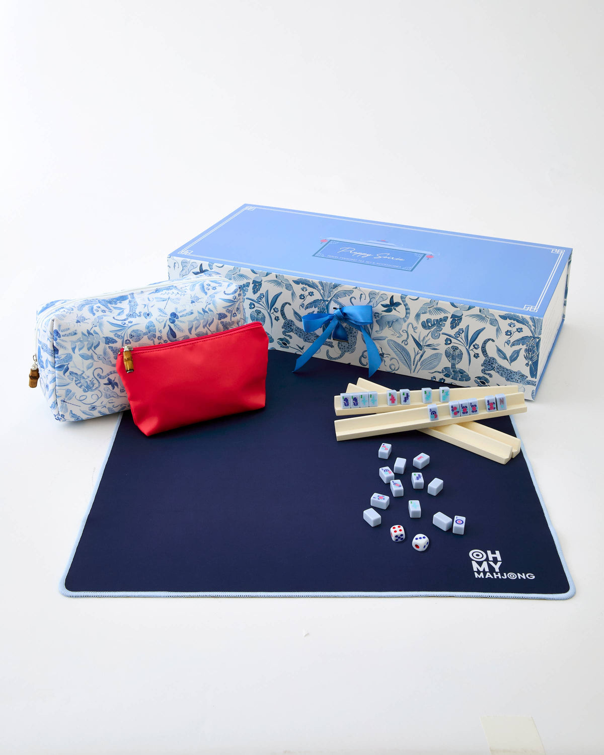 Mahjong set with tiles, dice, and carrying case on a white background