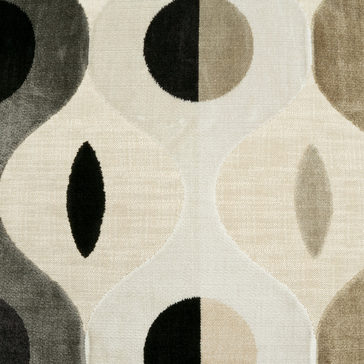 A close-up of a textured fabric or wallpaper pattern featuring a mid-century modern design with wavy beige and cream lines, black and taupe geometric shapes, and a subtle woven texture.