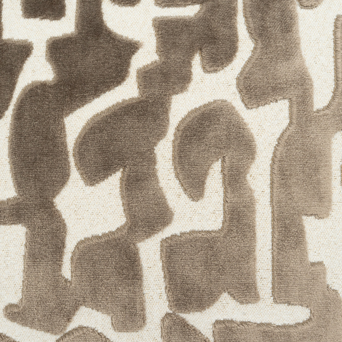 A close-up of a textured fabric or rug featuring an abstract, organic pattern in taupe and warm beige tones.