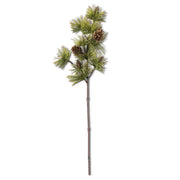 Artificial pine branch with cones on a white background