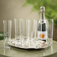 6 piece assorted etched champagne flutes. 