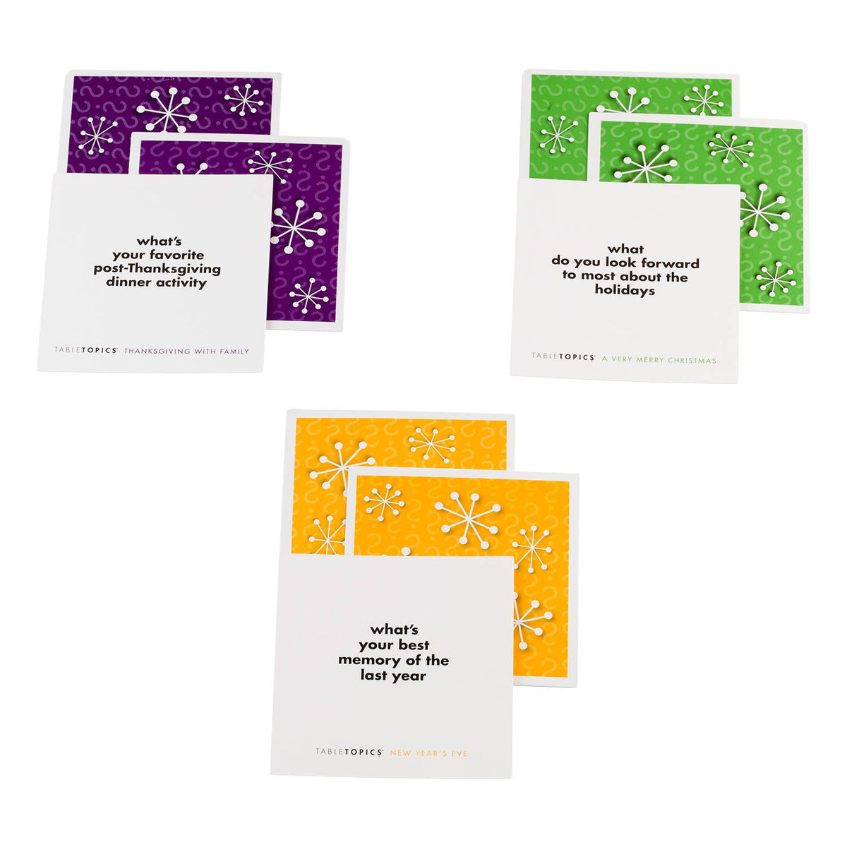 Three sets of Thanksgiving-themed greeting cards arranged on a white background. Each set includes a purple, green, and yellow card with a white card in front featuring black text prompts for family conversation.