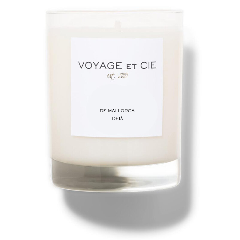 A soy candle in a clear glass jar with a white label reading 'VOYAGE ET CIE est. 201' and 'KYOTO BAMBOO', shown on a white background with a soft shadow.