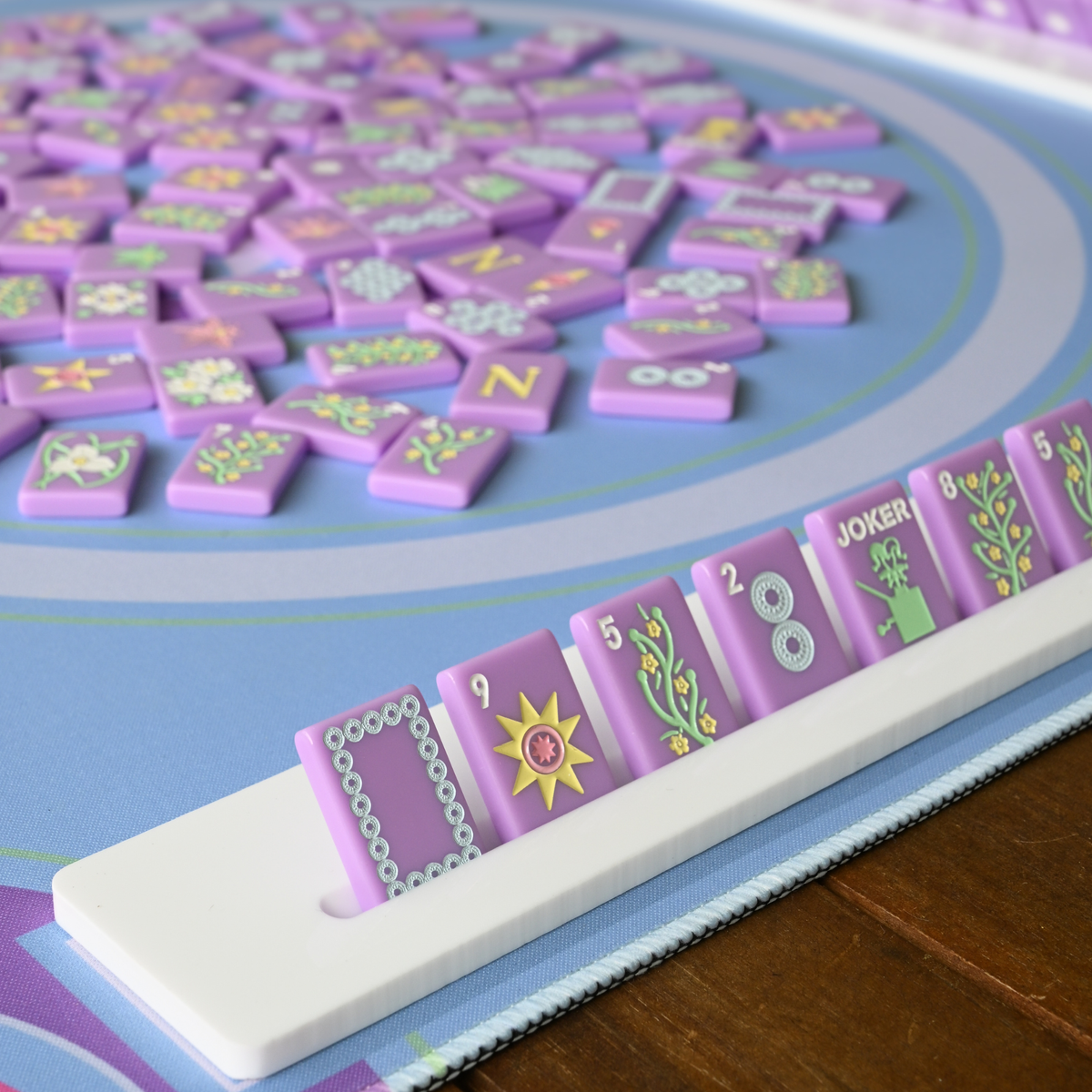 Mahjong game with colorful tiles on a blue board