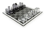 Modern glass chess set on a white background