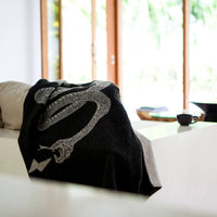 Peyote Rattlesnake black/light grey throw with ivory stitching. 