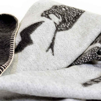 Peyote Rattlesnake Grey/Dark Grey throw with ivory stitching. 