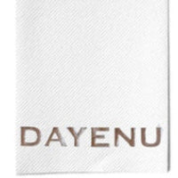 White fabric swatch with 'DAYENU' branding