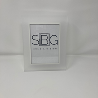White frame with 'SBIG HOME & DESIGN' logo on a white background