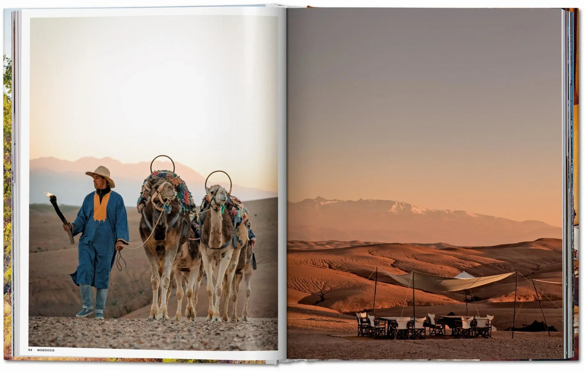 Inside spread of Great Escapes Africa showing a luxury safari lodge at sunset.