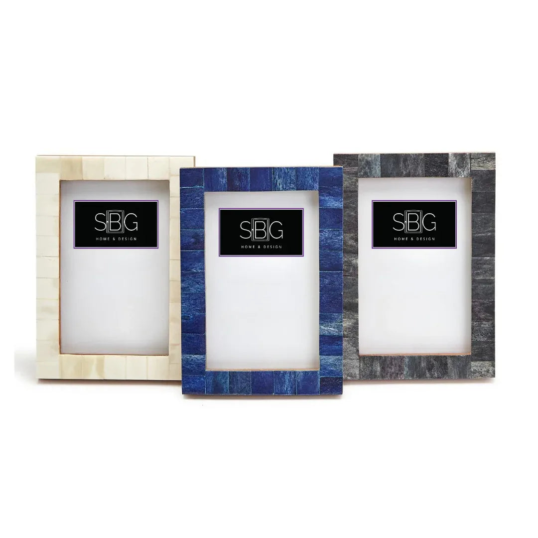 Three decorative picture frames with different designs on a white background