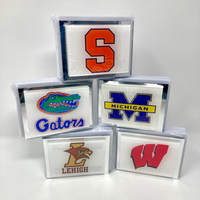 Collection of trading cards with various logos on a white background
