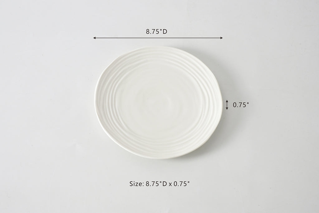 White ceramic plate with dimensions on a gray background