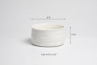 White ceramic pot with dimensions labeled on a light gray background