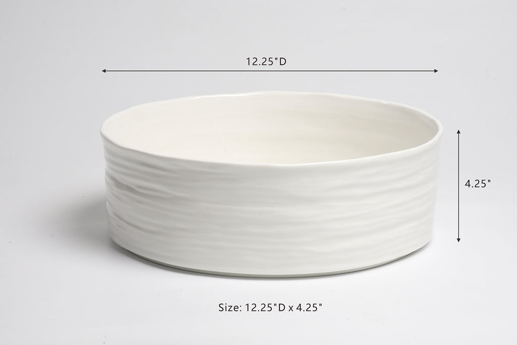 White ceramic bowl with dimensions labeled on a gray background