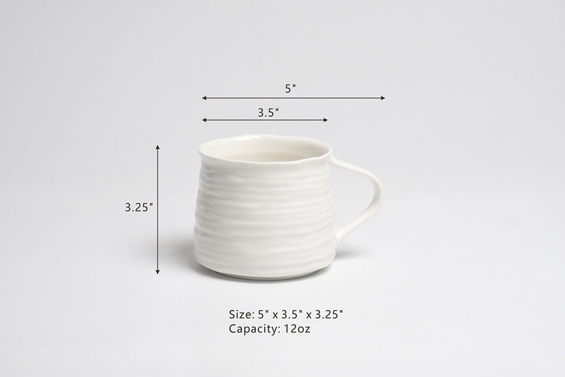 White ceramic mug with dimensions and capacity on a light gray background
