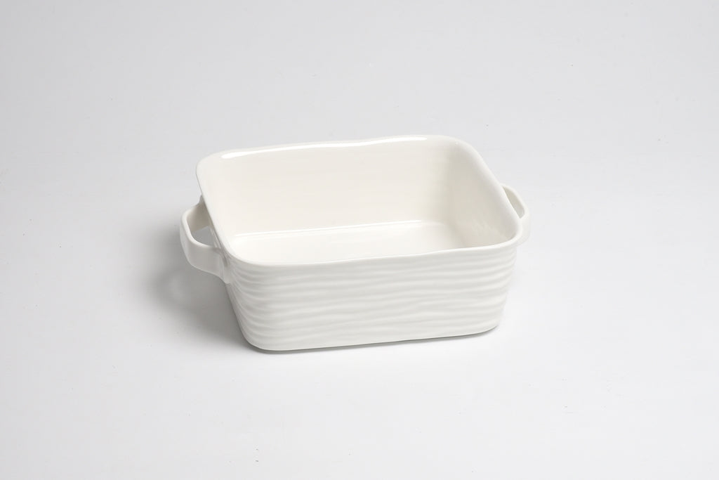 White ceramic rectangular dish on a light gray background