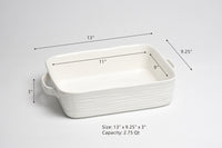 White ceramic baking dish with dimensions and capacity details on a gray background