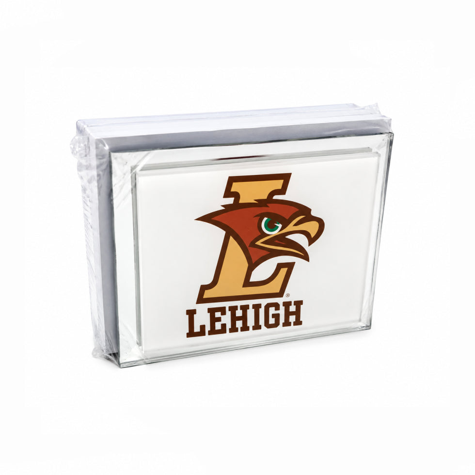 A clear acrylic block sign featuring the Lehigh University logo and 'LEHIGH' text, shown wrapped in protective plastic on a white background.
