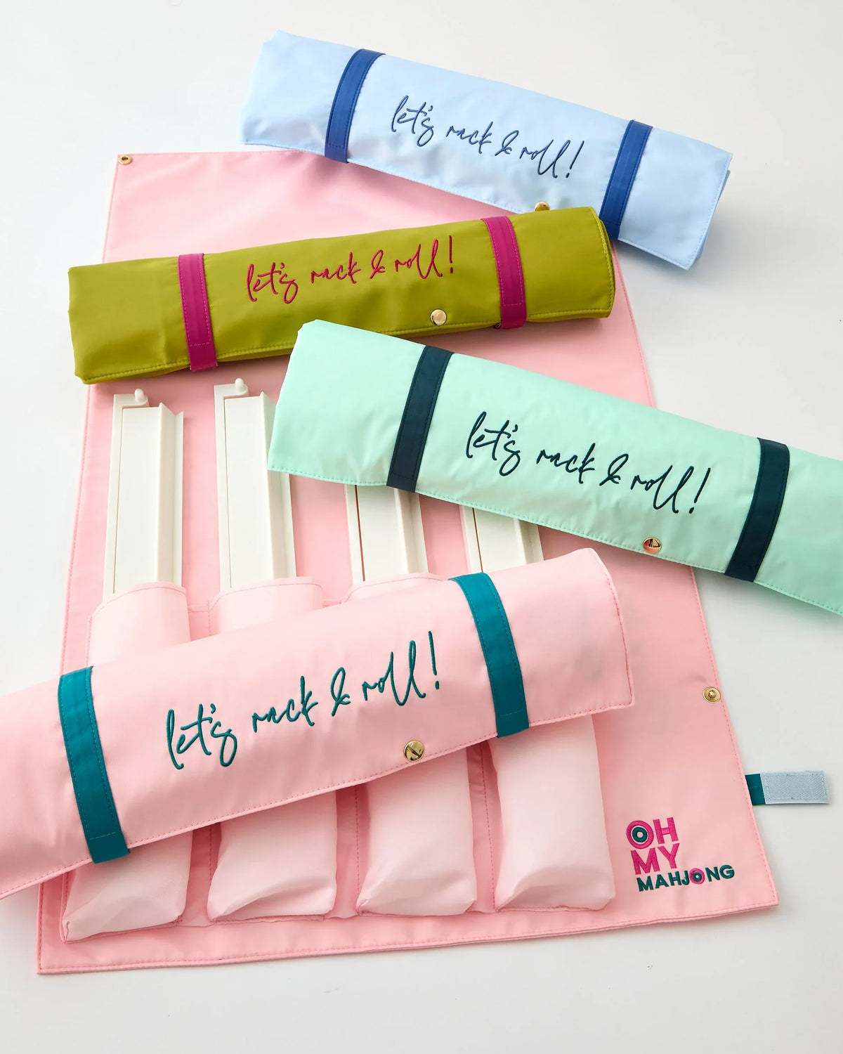 Set of colorful rolling organizer bags with 'let's rack & roll!' text on a white background