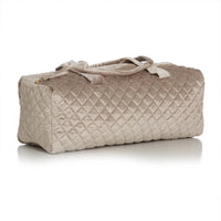 Quilted taupe mahjong duffel bag on a white background