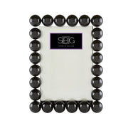 Black beaded frame with a white center on a white background, featuring the SBG logo.