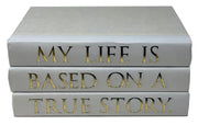 Three gray books with gold text on a white background Decorative Book Set, My Life Is Based On A True Story