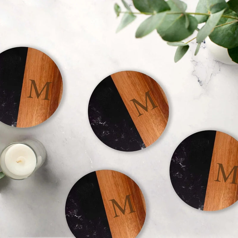 Round Marble & Acacia Wood Coasters in black marble with "M" monogram. 