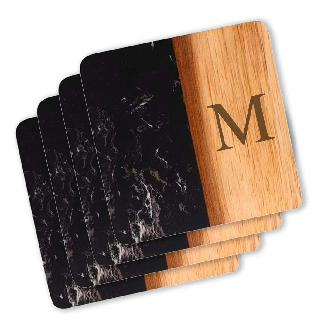 Square Marble & Acacia Wood Coasters in black marble with "M" engraved. 