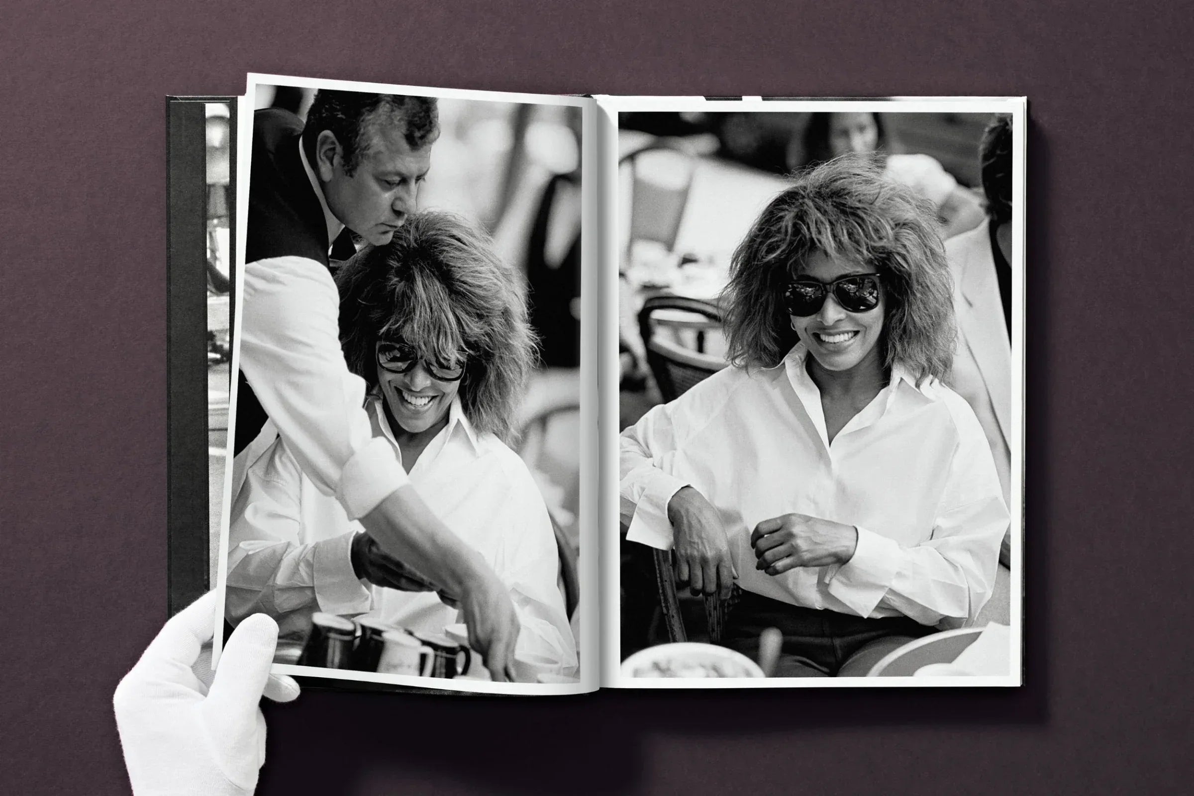 Album with black and white photos of a woman and a man, possibly from a music event. Fashion Photography
