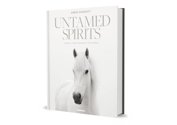 Book titled 'Untamed Spirits' with a horse's face on the cover against a white background