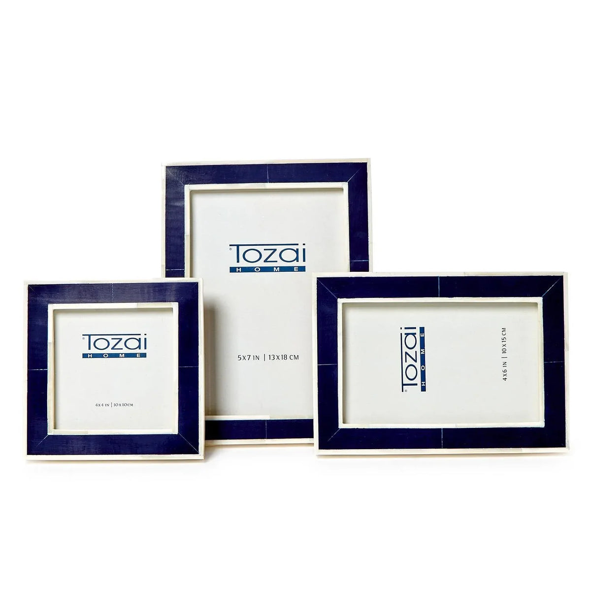 Three picture frames with navy blue accents on a white background, featuring the brand.