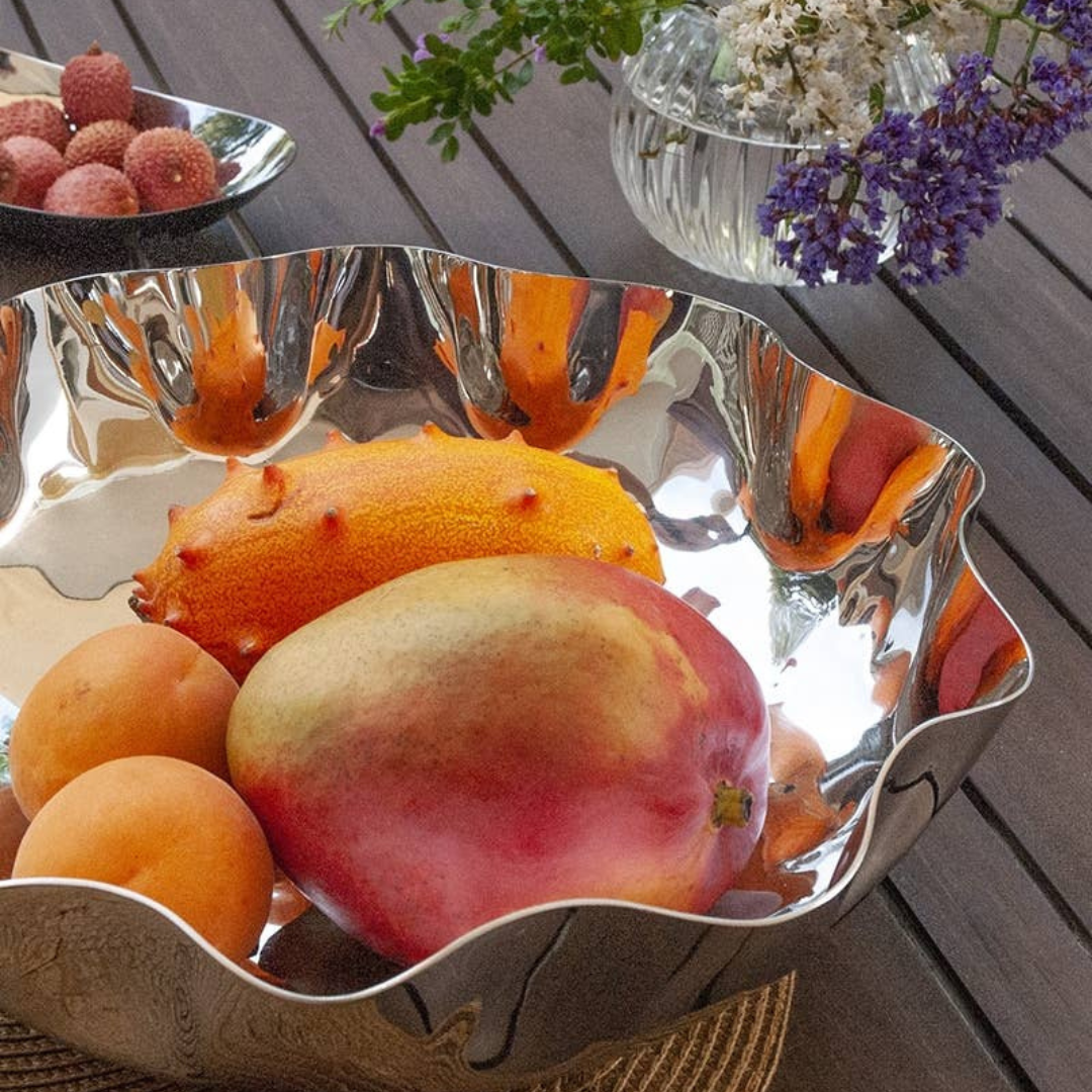 Blossom Free Form Stainless Bowl with fruits displayed. 