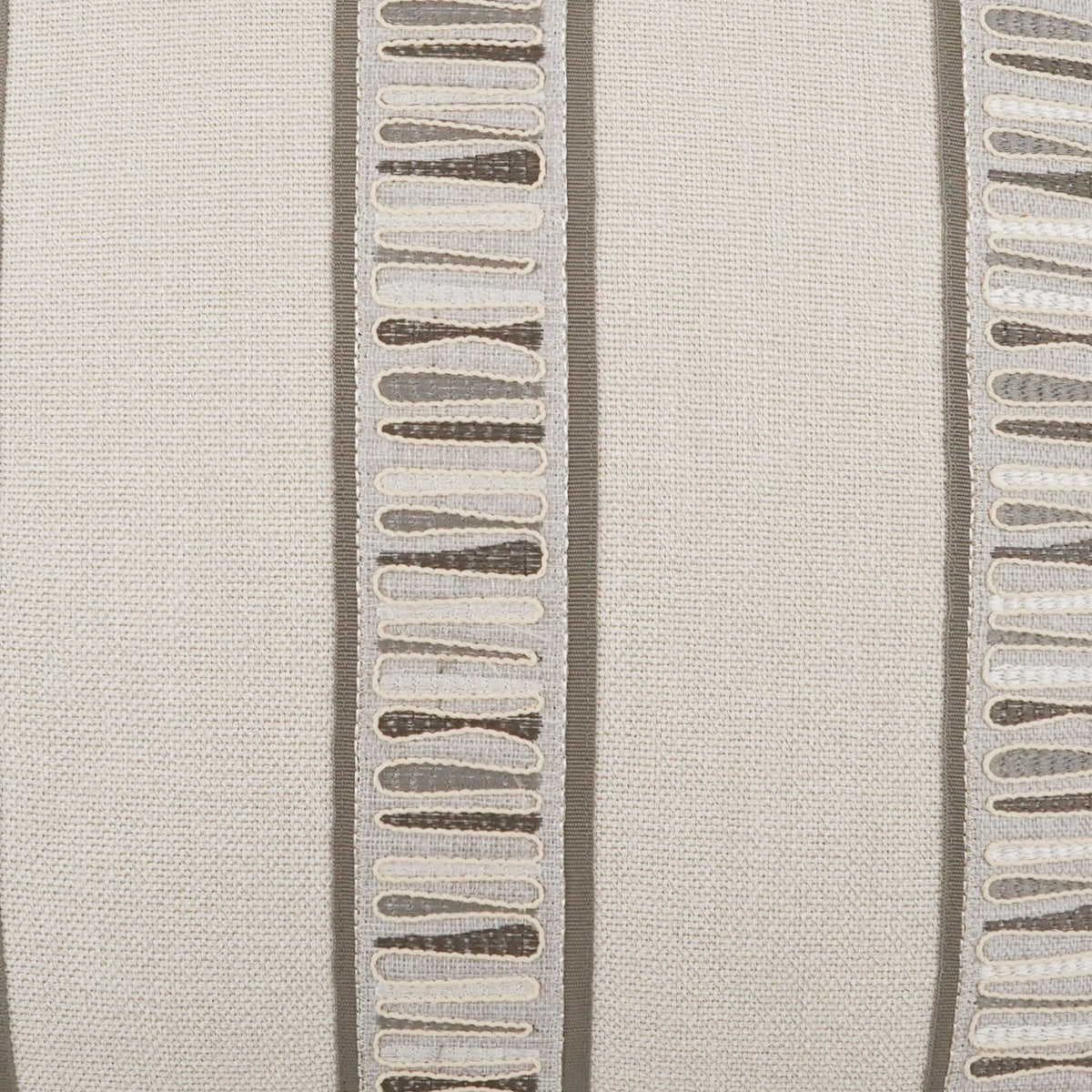 Textured fabric with a pattern of raised lines on a neutral background