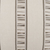 Textured fabric with a pattern of raised lines on a neutral background