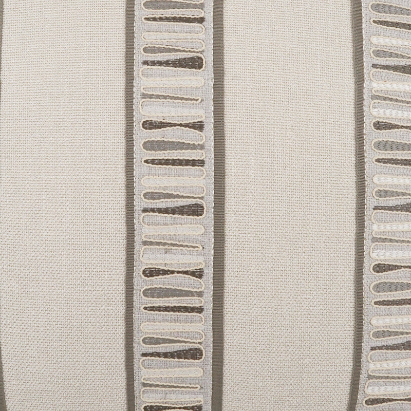 Textured fabric with a pattern of raised lines on a neutral background