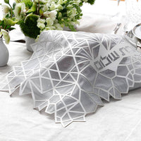 Geometric Challah Silver Cover displayed on a table. 