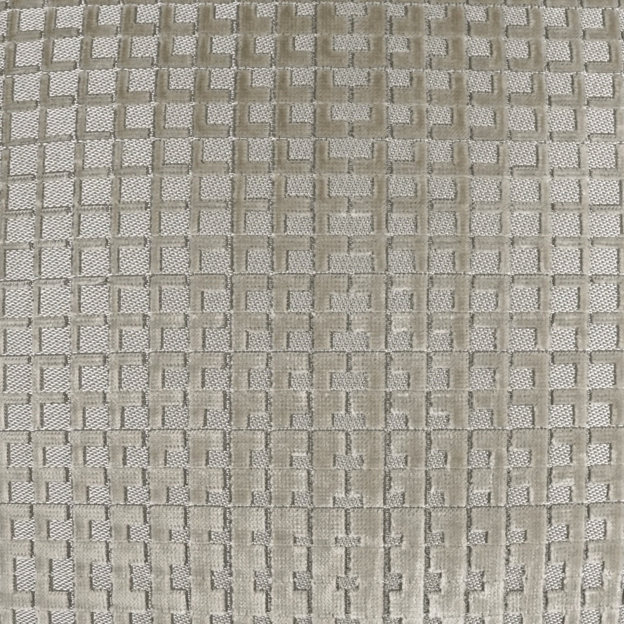 Textured fabric pattern with a grid-like structure in neutral tones.