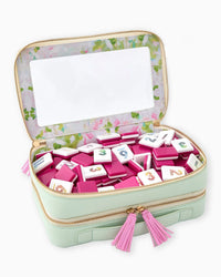 Travel case with letter tiles on a white background rummikub and mahjong