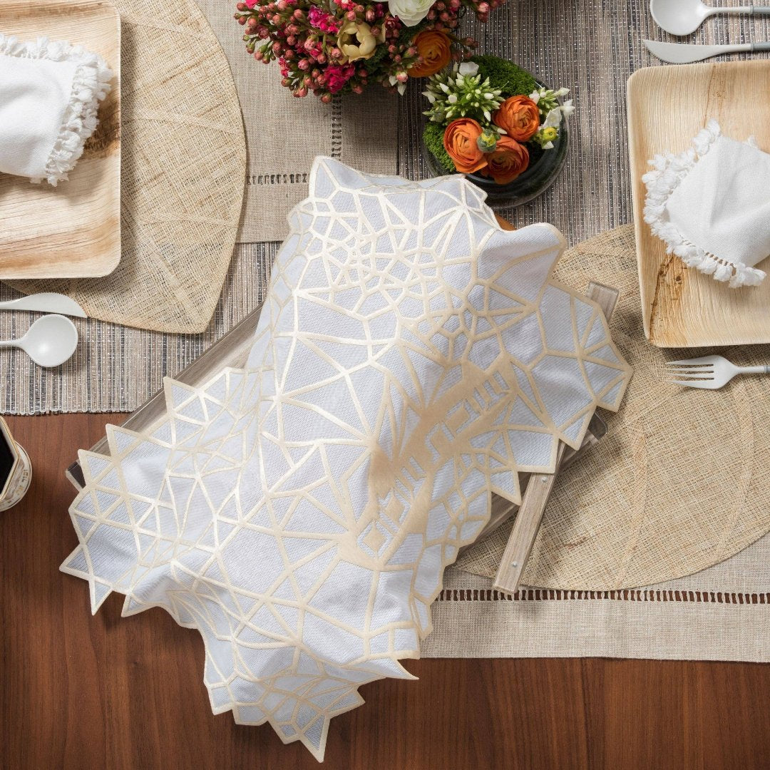 Cream Geometric Challah Cover displayed on a shabbat table.