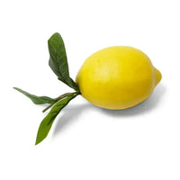 Yellow lemon with a green leaf on a white background