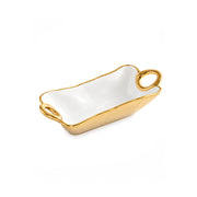 A rectangular white ceramic dish with a glossy gold rim, loop handles on both ends, and a shallow interior, shown on a plain white background.