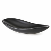 A black ceramic bowl with a smooth, glossy finish and a curved, organic shape, shown on a plain white background.