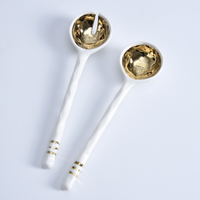 Porcelain Salad Server Set in gold. 